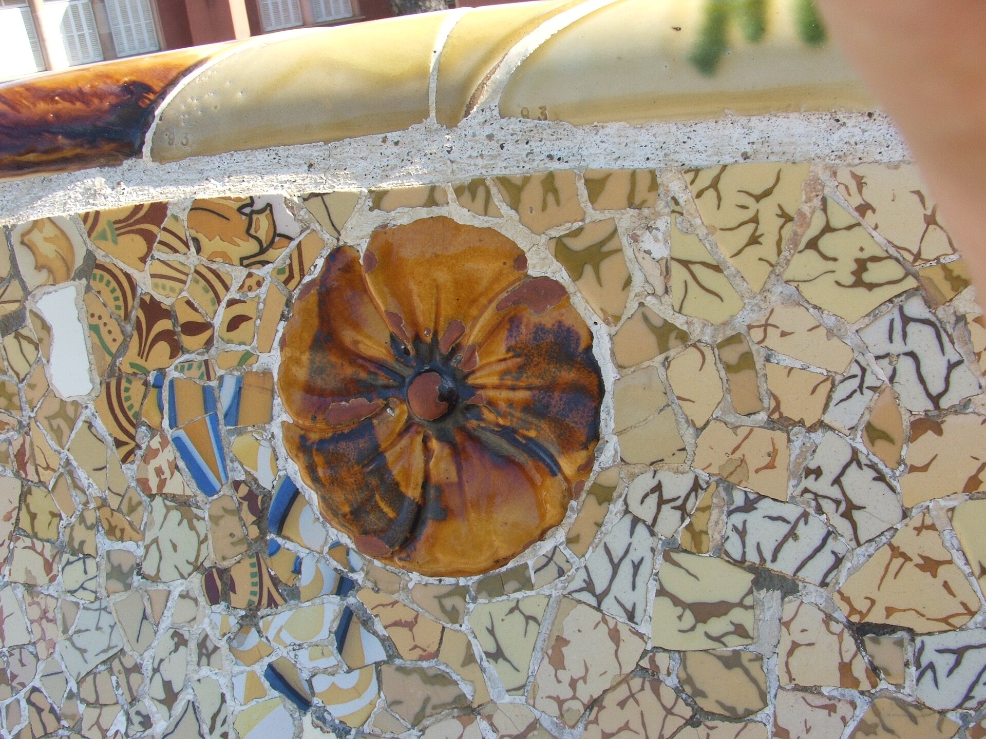 Mosaics of Park Güell Barcelona 01.jpg The World Heritage Site Park Güell harbours great biodiversity and cultural heritage of seven buildings and many designed by Antoni Gaudi in modern, eclectic and art nouveau style in the 19th century and early 20th c